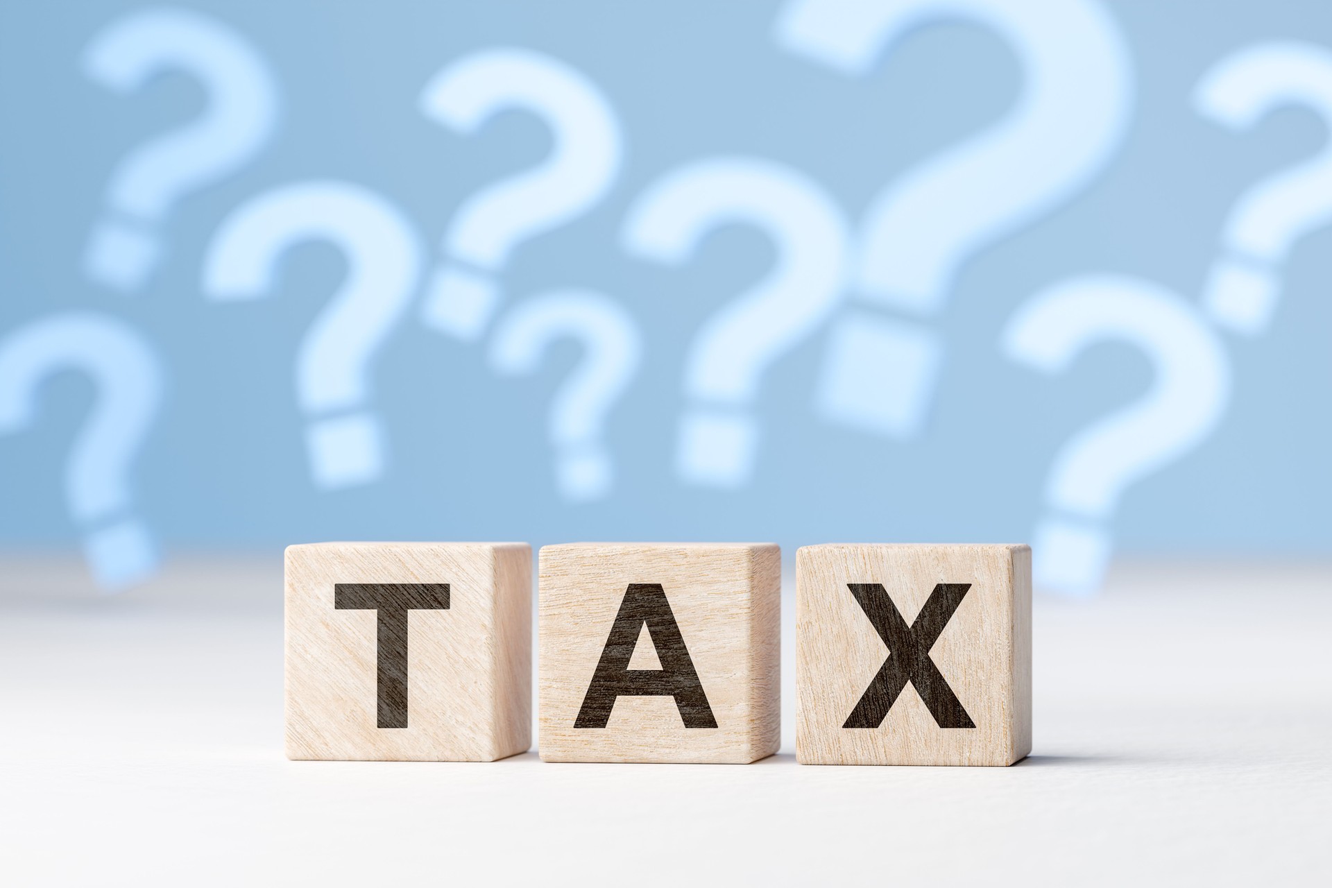 Tax Question mark. Questions and answers on taxation. income tax return form online for tax payment. Government, state taxes. Data analysis, paperwork, financial research, report.